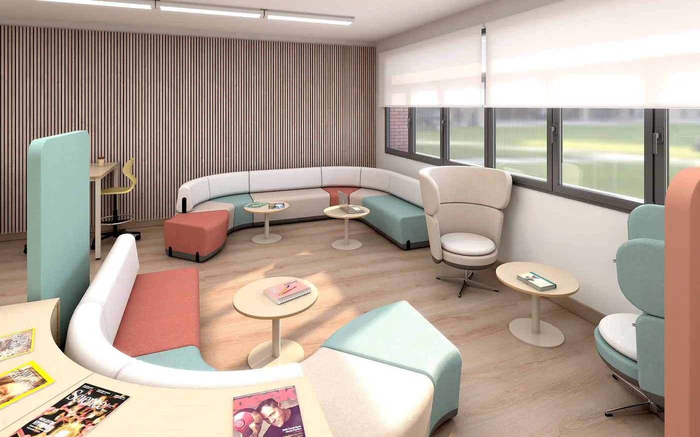 Lernlounge in der Schule mit Sofalandschaft, Sesseln und kleinen Tischen