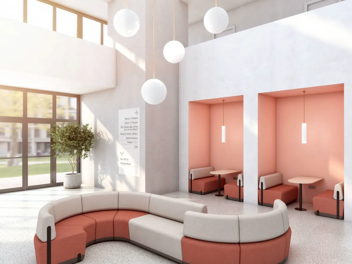 Modulares Sofa in Terrakotta und Beige als Sitzlandschaft im Schulfoyer